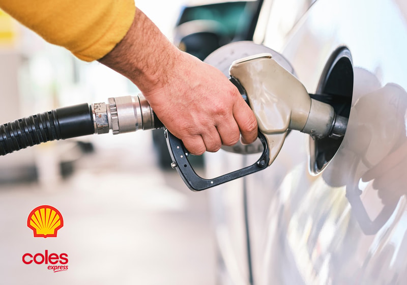 Card-Wide-2 3.pngwrite alt textClaude responded: Coles Express fuel — Close-up of a hand holding a fuel nozzle filling a white car at a Shell Coles Express service station, with the Shell and Coles Express lo…Coles Express fuel — Close-up of a hand holding a fuel nozzle filling a white car at a Shell Coles Express service station, with the Shell and Coles Express logos in the corner.